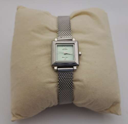 Pre-owned  Vintage Un-Used Orient ladies Watch -Working with new battery-still in packaging