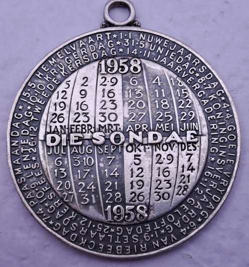 1958 Universiteit van Pretoria DIE SONDAE  medal- Holydays and Sunday Calender on back