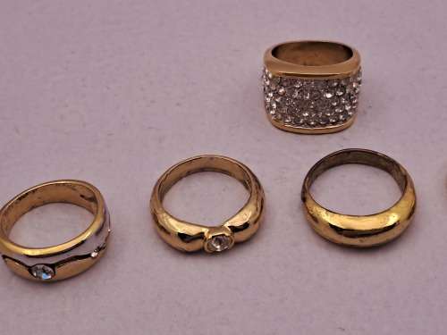 6 Pre-owned Ladies dress rings (Not Gold and not real Diaomds)
