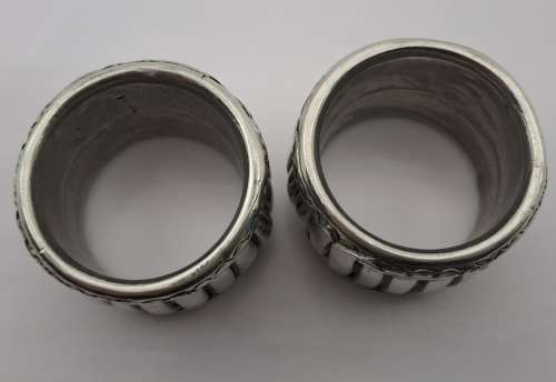 A Pair of Napkin/serviettes Rings designed by CARROL BOYES  46x34mm (solid design)