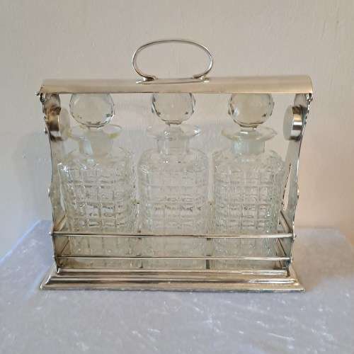 Antique Silver Plate Tantalus (3 Decanter set ) England -