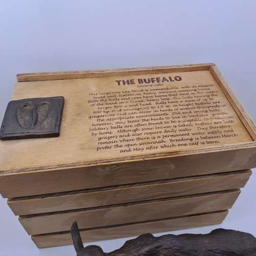 a Buffalo Figurine (Hand Made) in wooden Crate -ONE FOOT/HOOF BROKEN