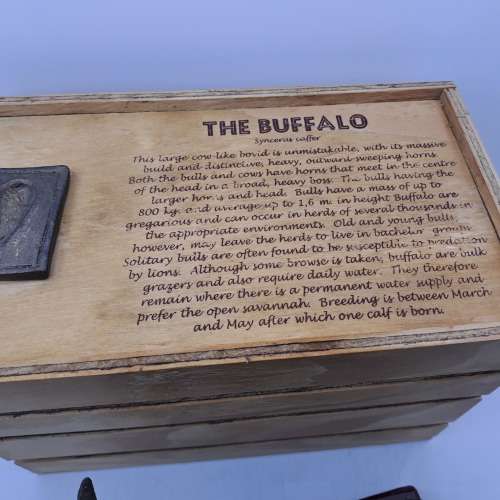 a Buffalo Figurine (Hand Made) in wooden Crate -ONE FOOT/HOOF BROKEN
