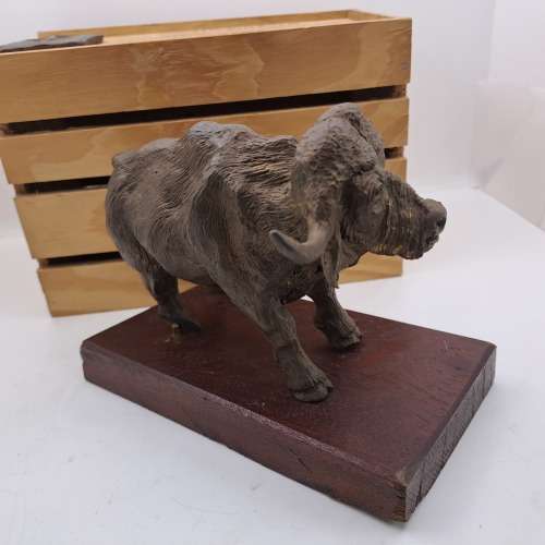 a Buffalo Figurine (Hand Made) in wooden Crate -ONE FOOT/HOOF BROKEN