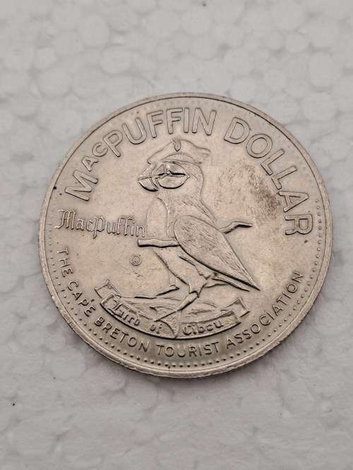 Collectable 1979  Canada MacPuffin Dollar Cape Breton Island, Nova Scotia- Tade Token