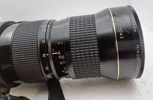 Pre-owned Vintage 1970`s Nikon Zoom Nikkor 50-300mm 1:4,5 with filter and cap
