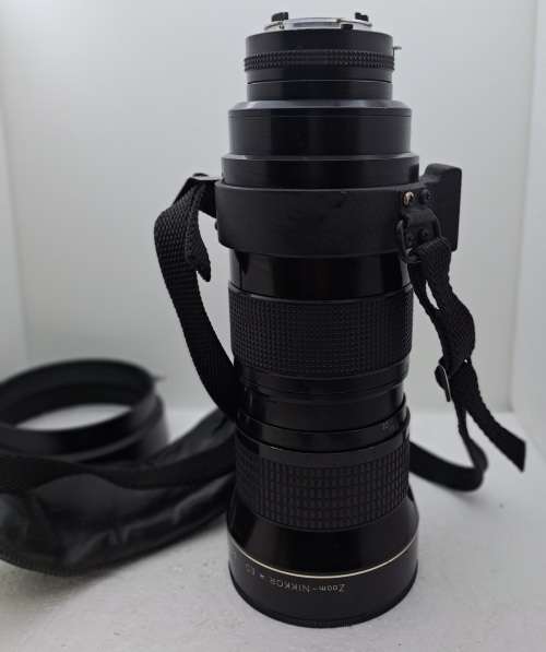 Pre-owned Vintage 1970`s Nikon Zoom Nikkor 50-300mm 1:4,5 with filter and cap
