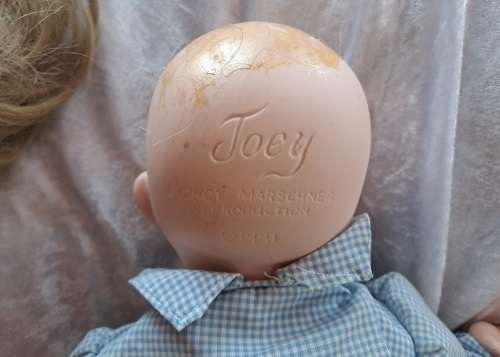 ` Joey` Porcelain Doll- a Cindy Marschner Reproduction 1991 -49cm x 33cm