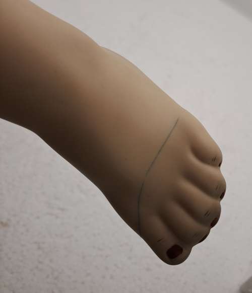 Porcelain Doll by Rubert 1992-The Doll Artworks -one foot was repaired