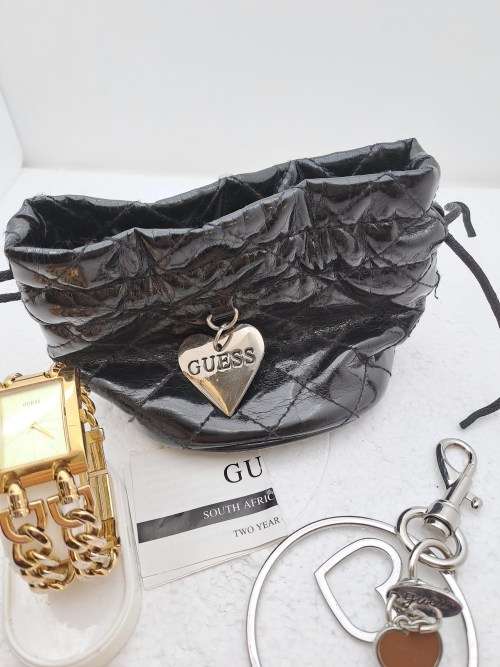 Pre-Owned Unused Ladies Guess watch plus Guess large Keyring with Heart Pendants in Guess Bag.