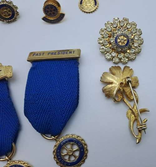 9 x Rotary International Items President and Past President Medals , Pins and Brooches
