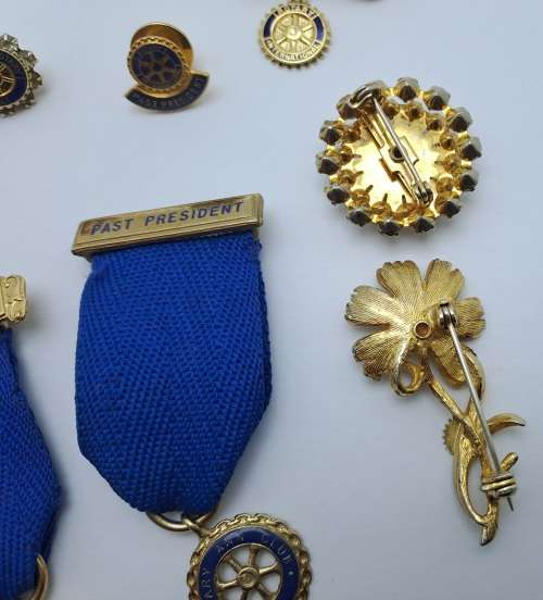 9 x Rotary International Items President and Past President Medals , Pins and Brooches