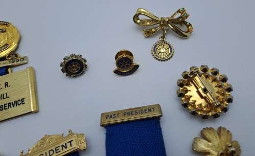 9 x Rotary International Items President and Past President Medals , Pins and Brooches