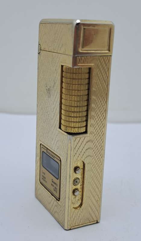 Vintage Sunnex lighter.. with Quartz Clock (Clock working) Lighter Not tested- made in Korea