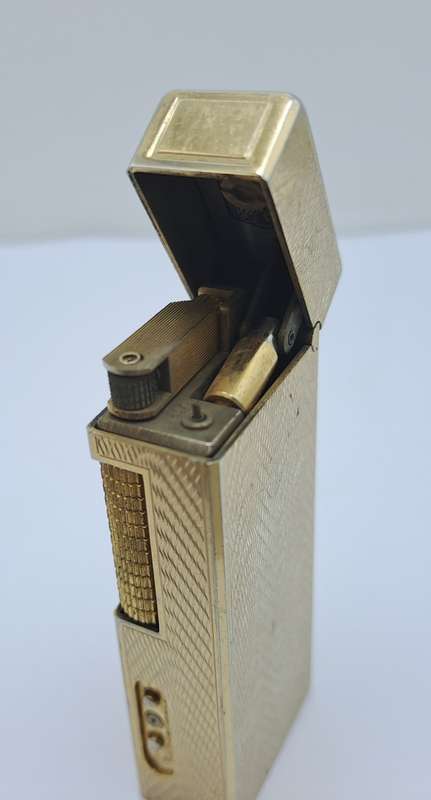 Vintage Sunnex lighter.. with Quartz Clock (Clock working) Lighter Not tested- made in Korea