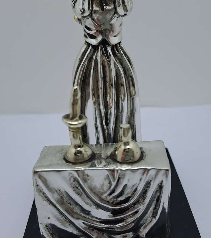 Collectable Sterling Silver Statue Candlelight Sabbath by a Jewish housewife.(one candle broken)