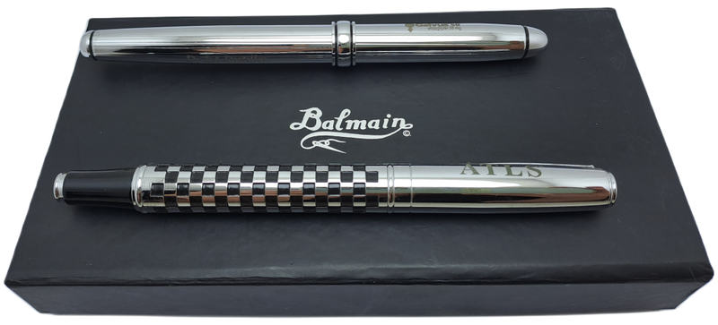 2 Pre-owned Balmain Ballpoint Pens -Boxed- Branded and one engraved -Ink is ok