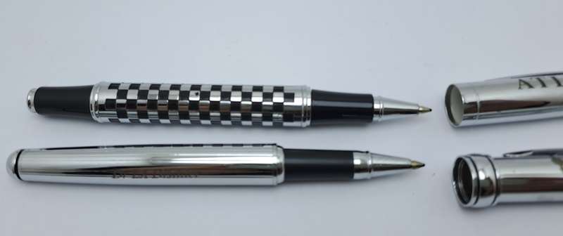 2 Pre-owned Balmain Ballpoint Pens -Boxed- Branded and one engraved -Ink is ok