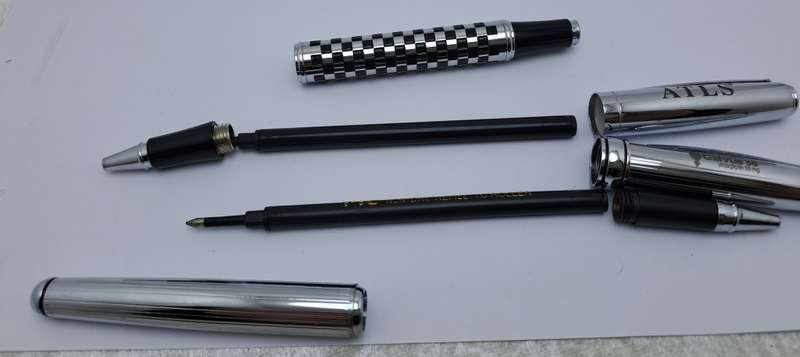 2 Pre-owned Balmain Ballpoint Pens -Boxed- Branded and one engraved -Ink is ok
