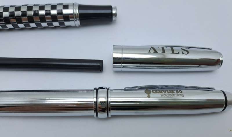 2 Pre-owned Balmain Ballpoint Pens -Boxed- Branded and one engraved -Ink is ok