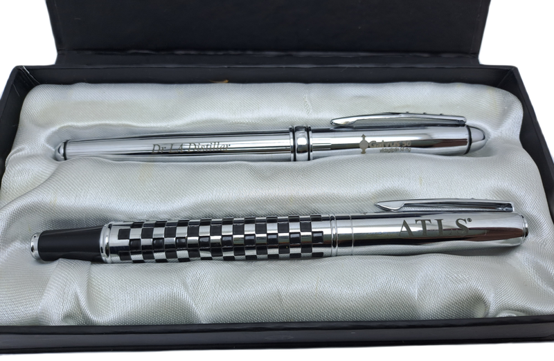 2 Pre-owned Balmain Ballpoint Pens -Boxed- Branded and one engraved -Ink is ok