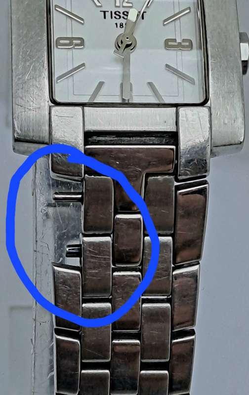 Pre-owned Ladies Tissot Quartz Watch L835/935 SKP-JA-1 -Working- a piece of the strap is missing,