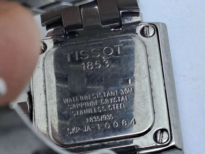 Pre-owned Ladies Tissot Quartz Watch L835/935 SKP-JA-1 -Working- a piece of the strap is missing,