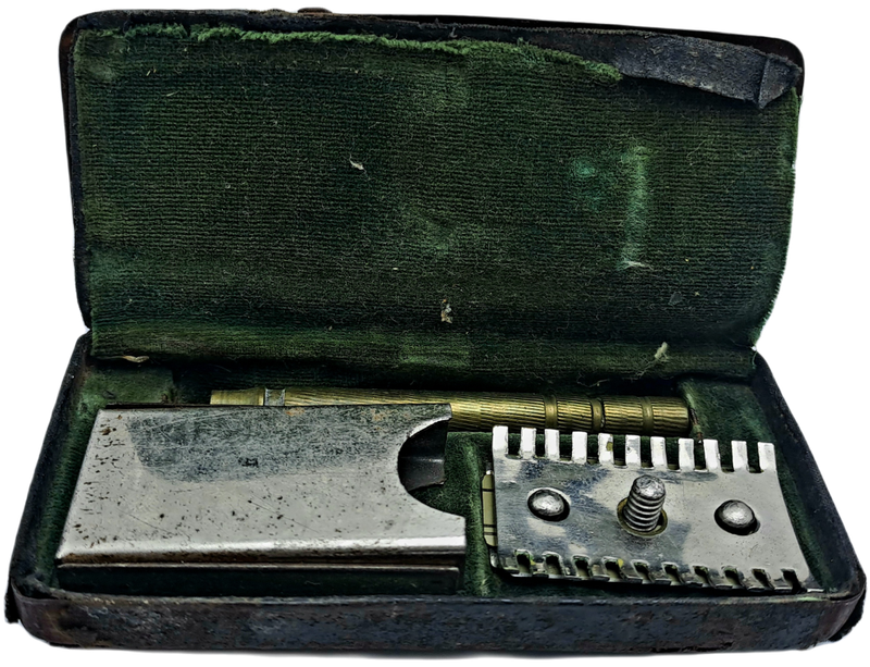 Antique Mens traveling Razot set in Tin . outside cover of tin in bad shape
