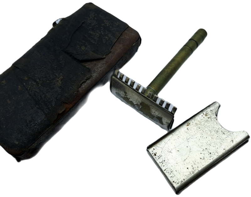 Antique Mens traveling Razot set in Tin . outside cover of tin in bad shape