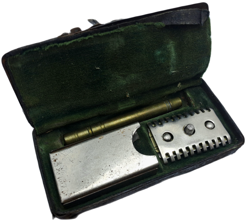 Antique Mens traveling Razot set in Tin . outside cover of tin in bad shape