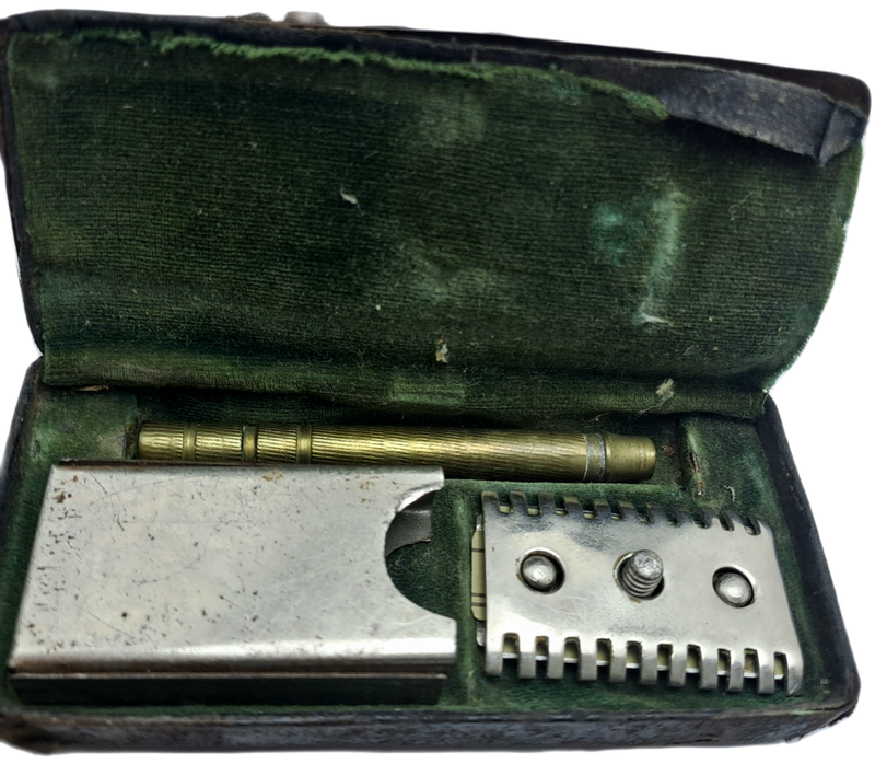 Antique Mens traveling Razot set in Tin . outside cover of tin in bad shape