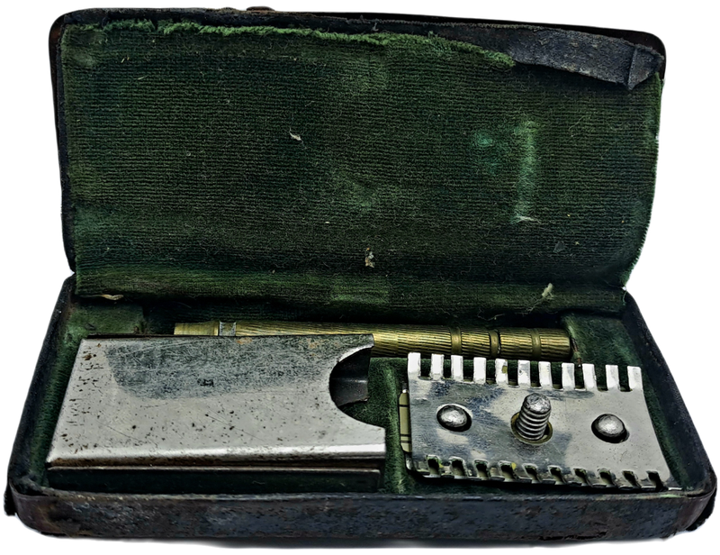 Antique Mens traveling Razot set in Tin . outside cover of tin in bad shape
