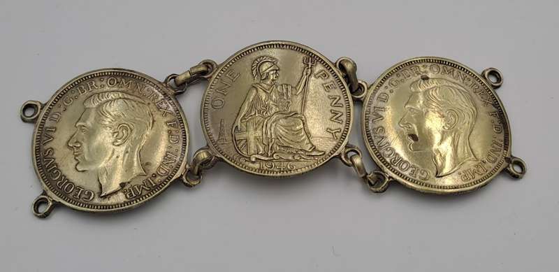 Part of a Vintage Bracelet with 1946 Pennies Cut In Half