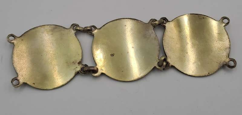 Part of a Vintage Bracelet with 1946 Pennies Cut In Half
