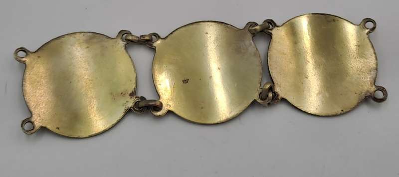 Part of a Vintage Bracelet with 1946 Pennies Cut In Half
