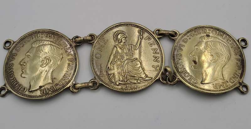 Part of a Vintage Bracelet with 1946 Pennies Cut In Half