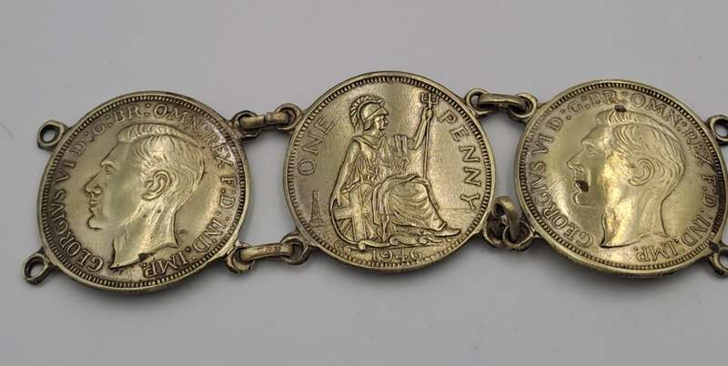 Part of a Vintage Bracelet with 1946 Pennies Cut In Half