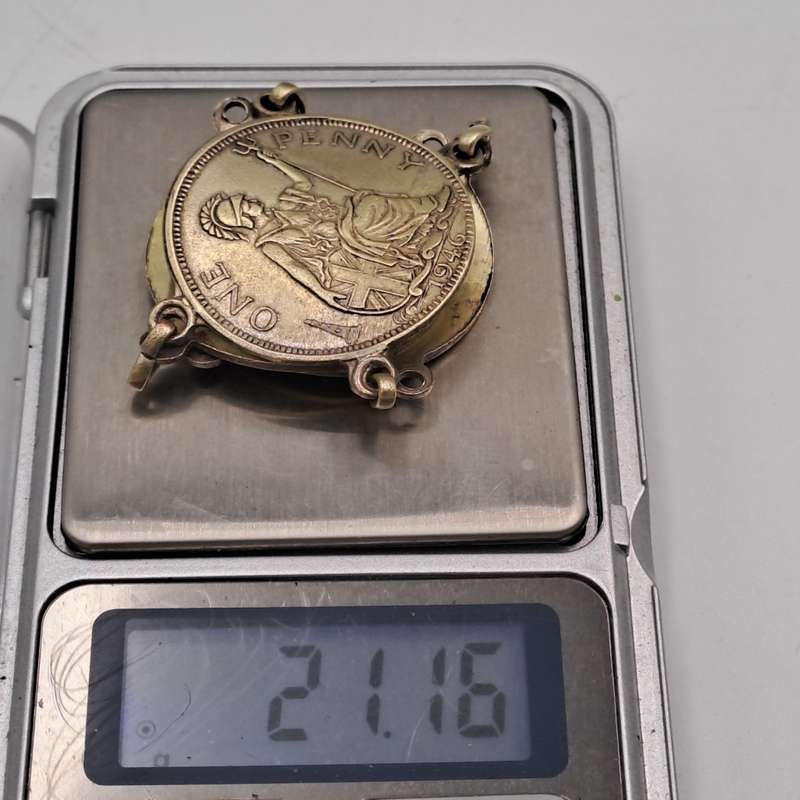 Part of a Vintage Bracelet with 1946 Pennies Cut In Half