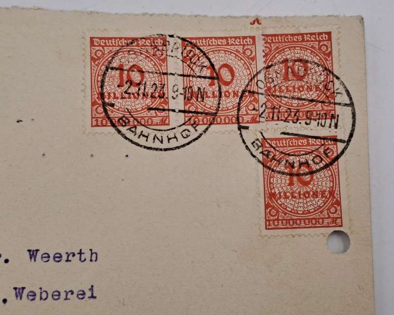 A 1923 Postcard in German with 4 Germany inflation 10 million Mark stamps.
