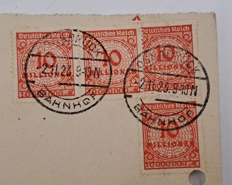 A 1923 Postcard in German with 4 Germany inflation 10 million Mark stamps.