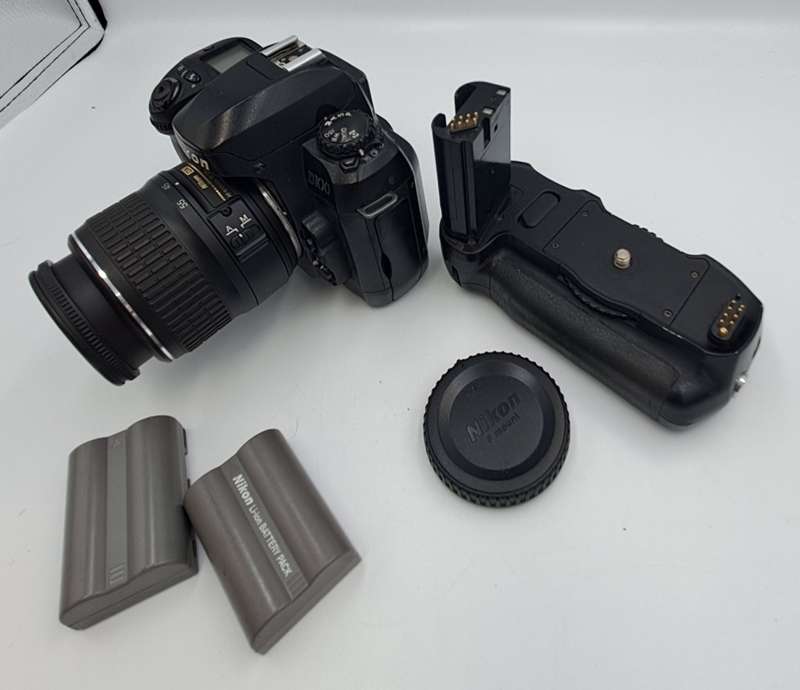 2002 Nikon D100 DSLR Camera with Nikon AF-S DX Nikkor ED 18-55mm Lens and Multi Func. Battery Pack