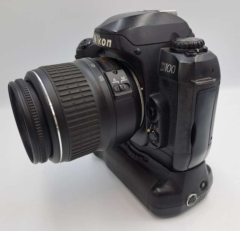 2002 Nikon D100 DSLR Camera with Nikon AF-S DX Nikkor ED 18-55mm Lens and Multi Func. Battery Pack