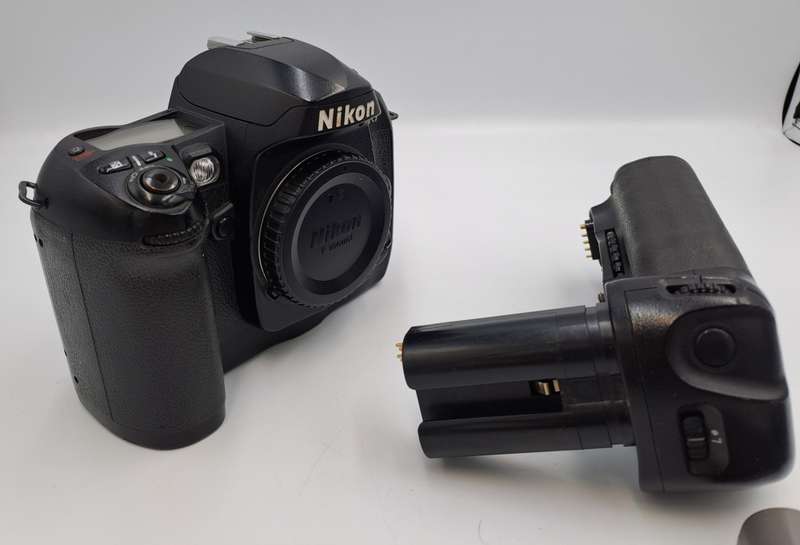 2002 Nikon D100 DSLR Camera with Nikon AF-S DX Nikkor ED 18-55mm Lens and Multi Func. Battery Pack