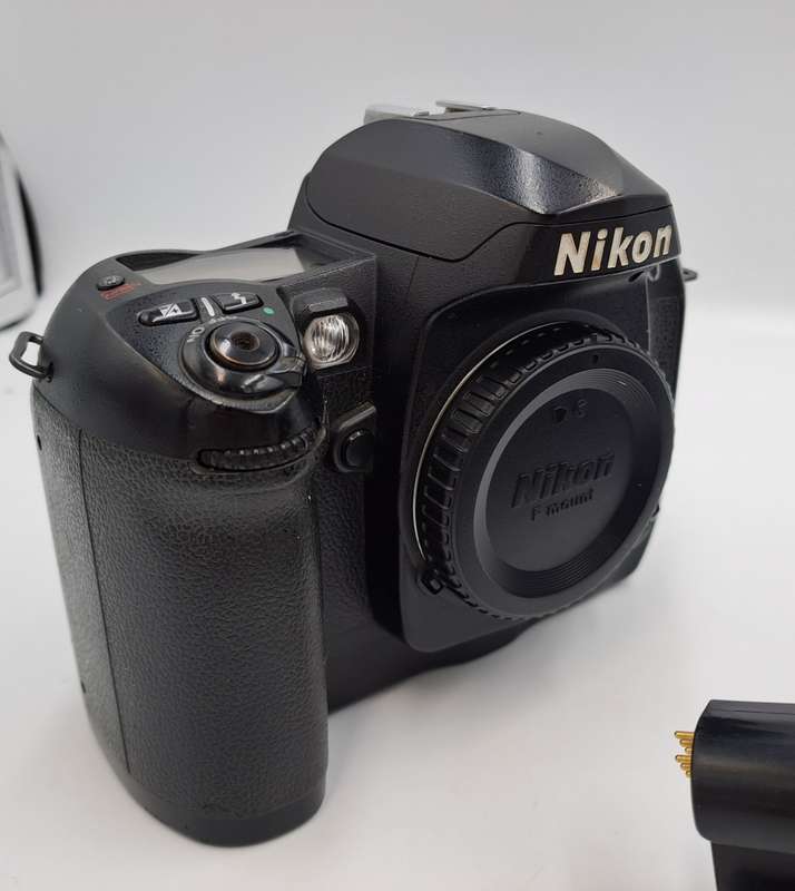 2002 Nikon D100 DSLR Camera with Nikon AF-S DX Nikkor ED 18-55mm Lens and Multi Func. Battery Pack