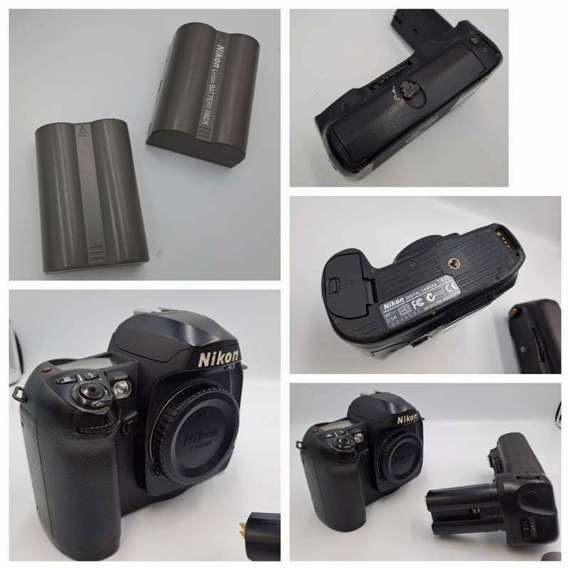 2002 Nikon D100 DSLR Camera with Nikon AF-S DX Nikkor ED 18-55mm Lens and Multi Func. Battery Pack