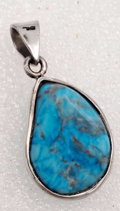 A Sterling 925 Sterling Silver Pendant with a Turquoise Phosphate Mineral stone (Turkish Stone)