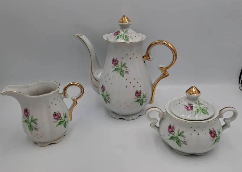 17 Pc Porcelain Teaset  Rose design - 1 cup was replaced with a different Pattern-Small Set