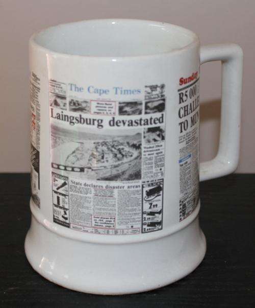 A Crescent Ware Mug with 1981 newspapers Prints see all photo's eg .Laingsburg flood disaster.