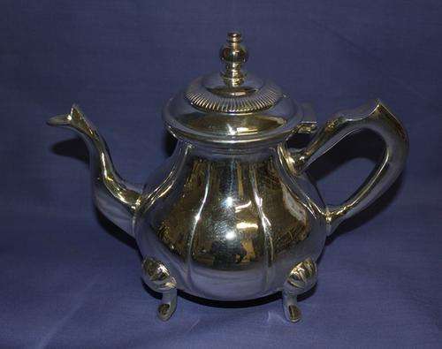 a Royal Manchester Silver plated Tea pot  980g -240mm (w) x 200mm (h)-  See more