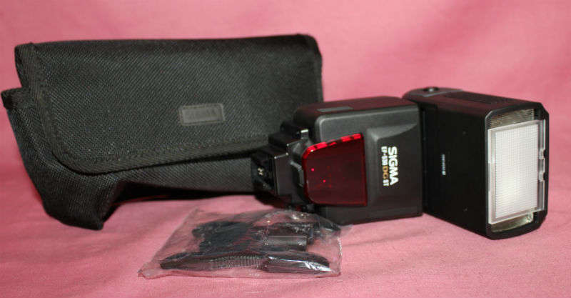 Sigma EF-530 DG ST flash (like new) with bag  (please ensure this will fit your Camera)-see more